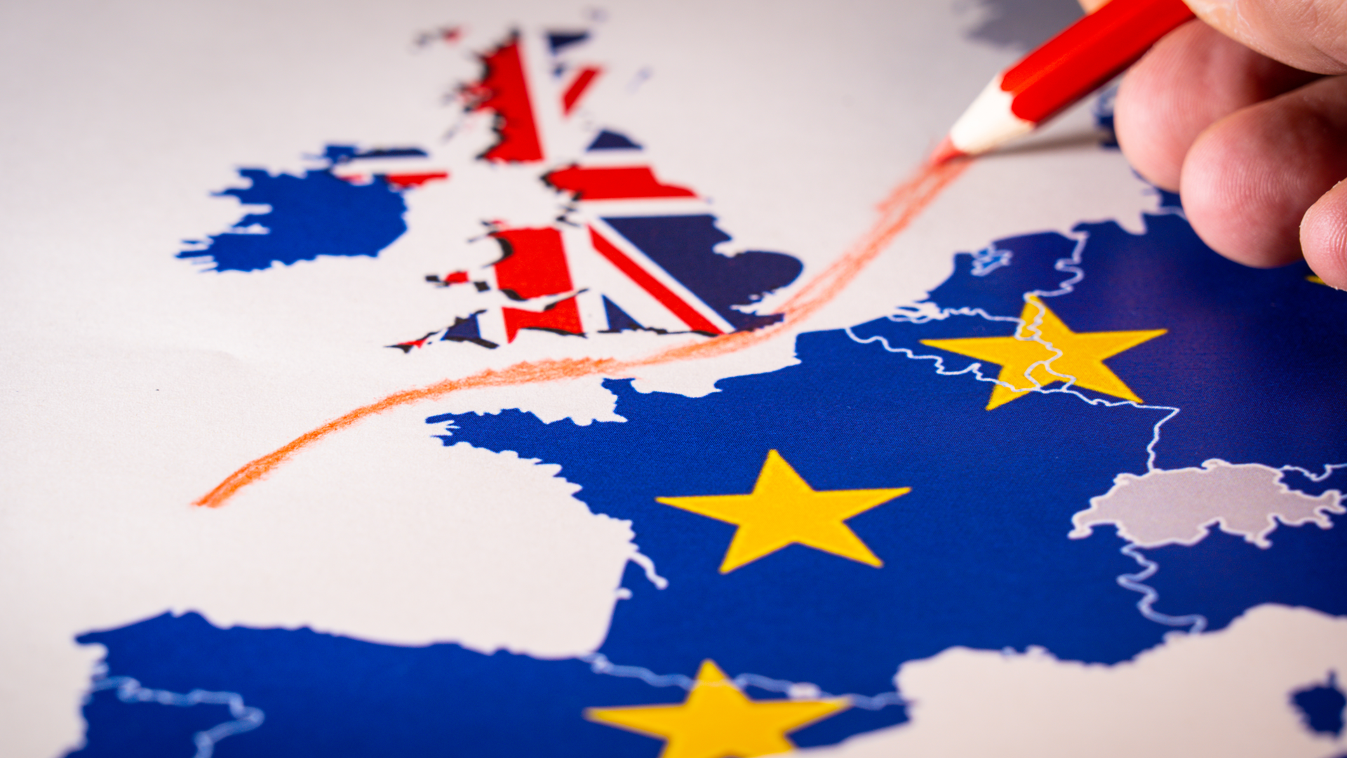 Brexit_221858285 A red line is drawn on a map, separating the UK from the European Union.
