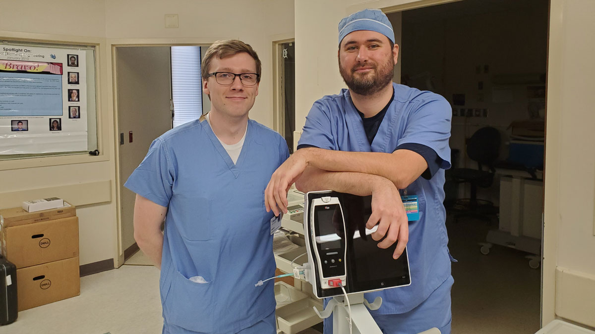 McLaren Health Care BMET Apprentices Spencer Cottrell and Mitchell Roach stand side-by-side.