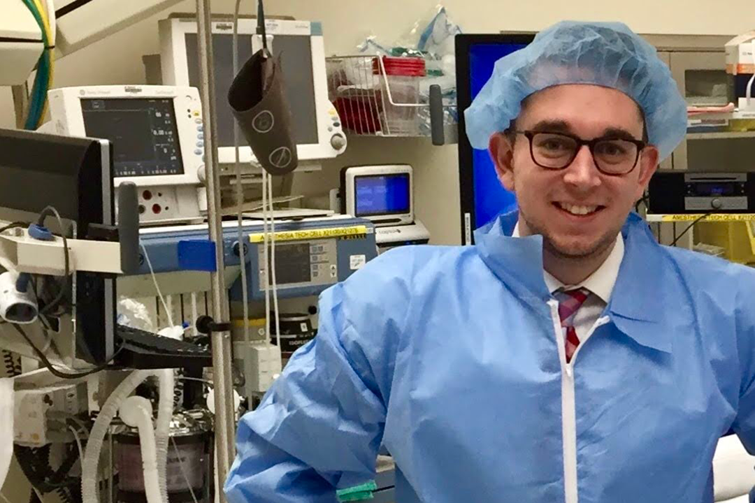 Nathan Lynch poses in full PPE during his time at an HTM department.