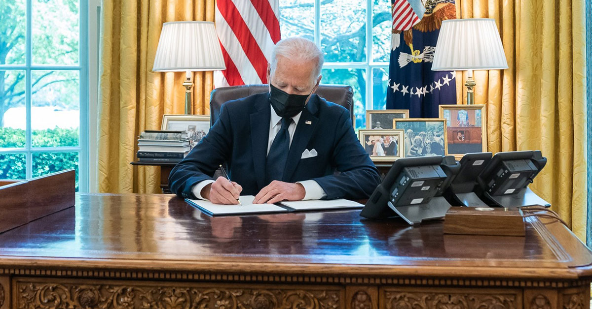 President Joe Biden signs an Executive Order